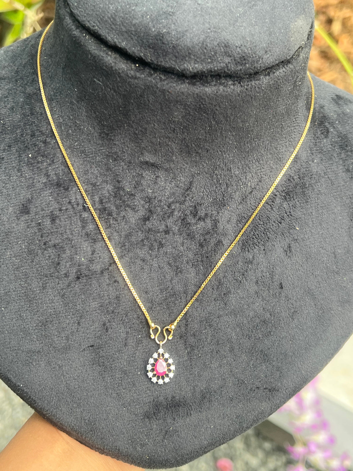 Party wear diamond finish  very small ruby  pendant (not sweat proof )with gold plated chain product code D124