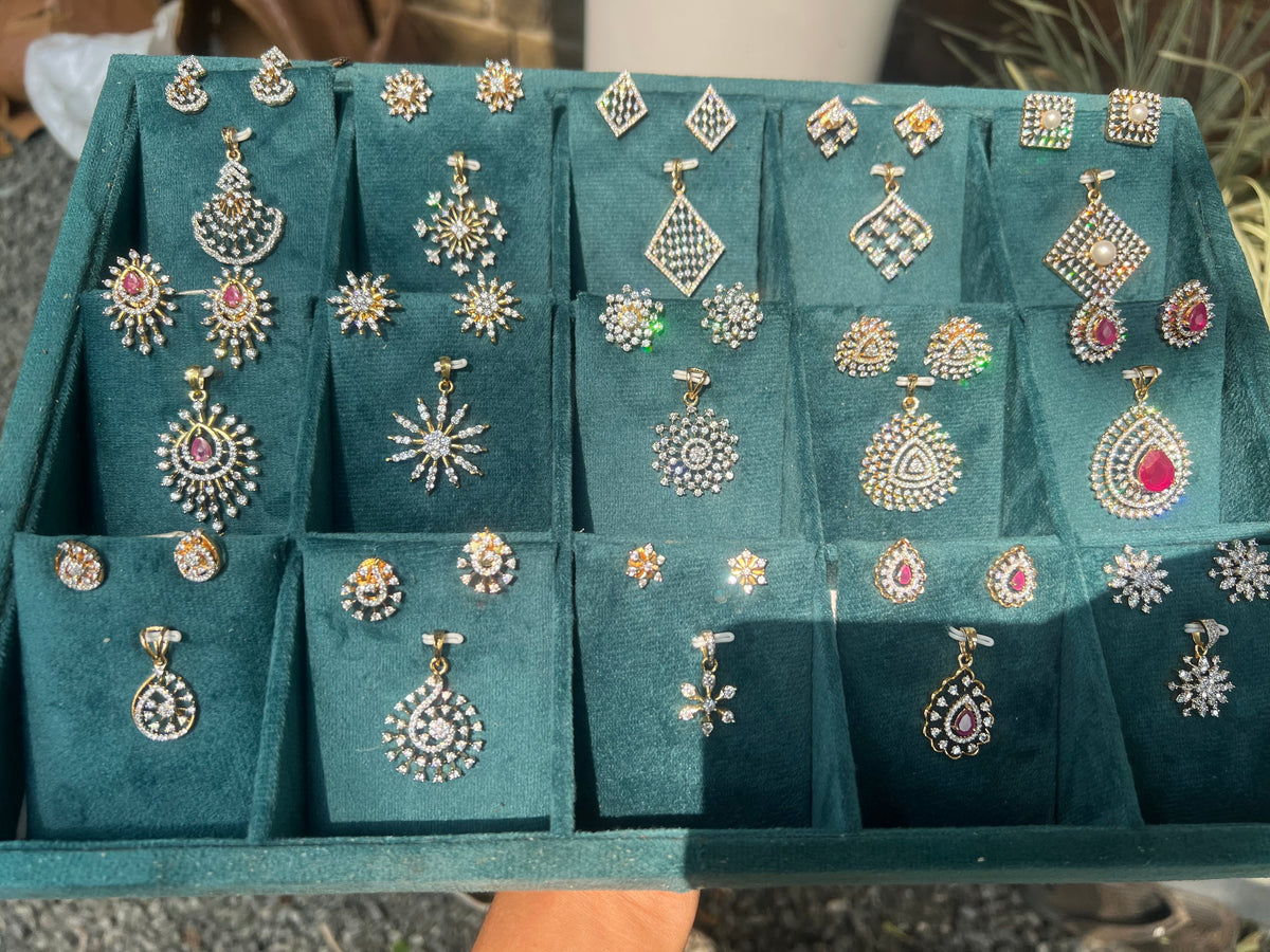 Premium diamond finish party wear repolishable pendant set product code D225