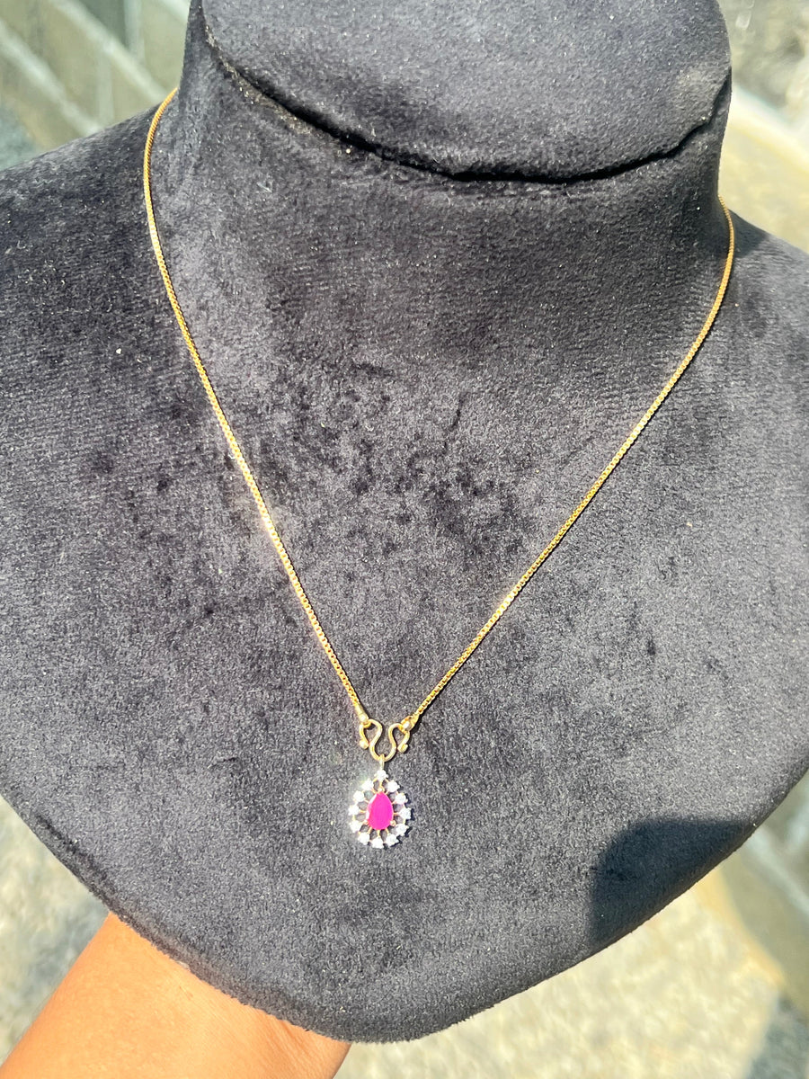 Party wear diamond finish  very small ruby  pendant (not sweat proof )with gold plated chain product code D124